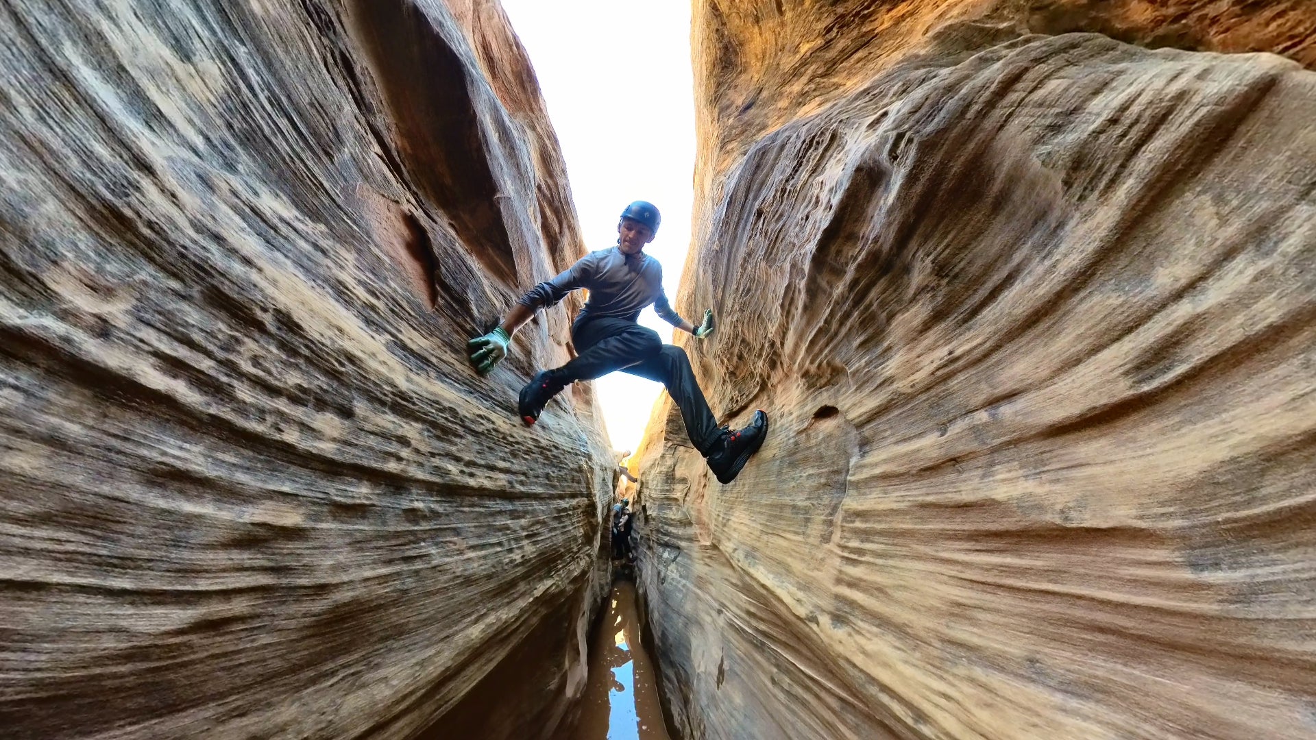climbing in a slot canyon