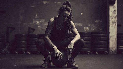 female athlete in a gritty gym - zoba fuel